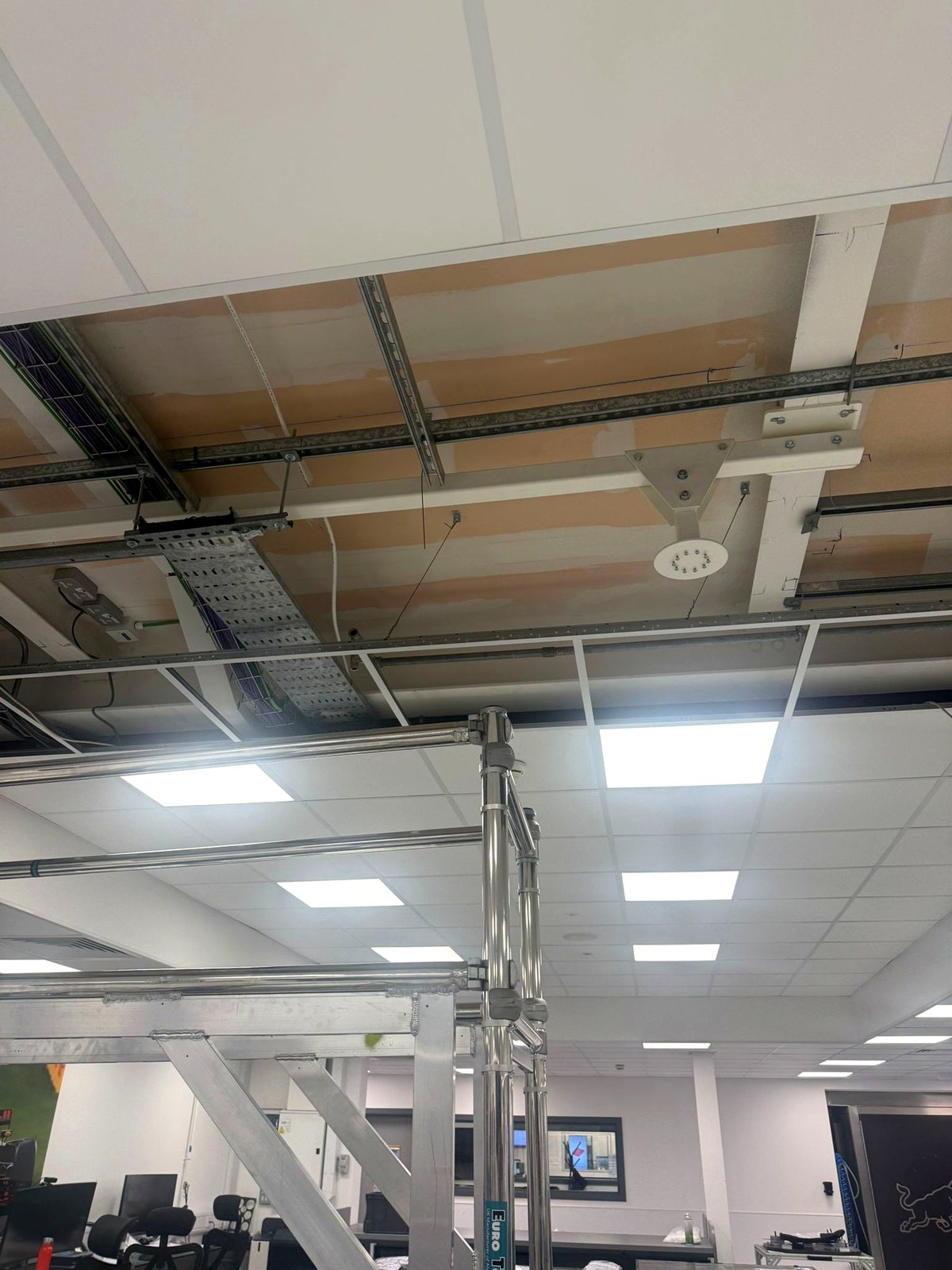 Bespoke steel ceiling bracket for display screens at Red Bull Technology, Milton Keynes
